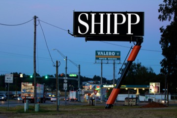 Queen City S face billboard